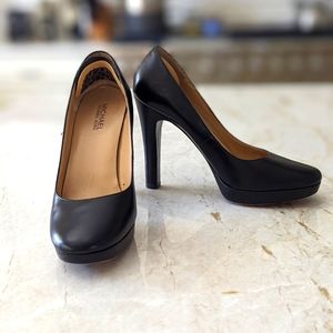 Black. Michael kors size 8 leather platform heels